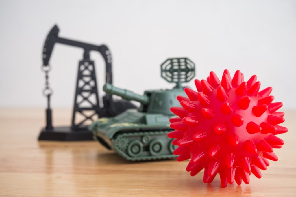 Toys in the shape of an oil well, tank and bomb